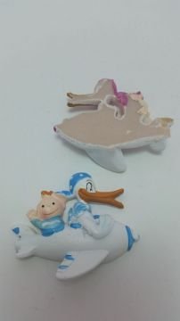 bebek ve donald duck uçakta